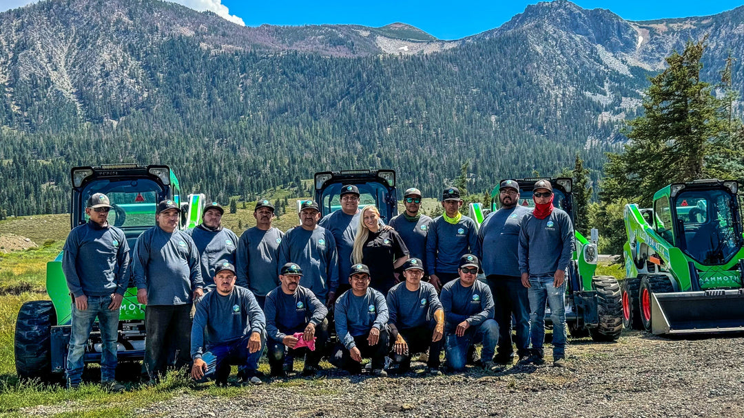 Mammoth Landscape employees with wrapped equipment